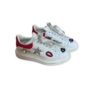 Limited Edition Alexander McQueen oversized white sneakers with red suede back